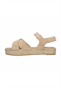 Beige suède espadrille sandaal met een breed kruisbandontwerp, verstelbare hielband en een geweven jute buitenzool. Platter profiel.
