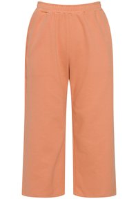 Lyse orange, løstsiddende bukser lavet af blødt stof. Har en elastisk talje og sidelommer, med et bredt bukseben design for komfort.