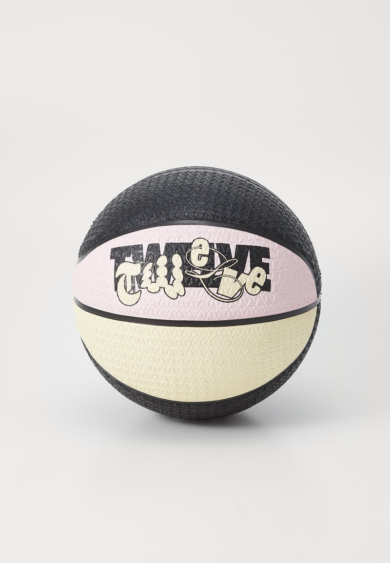 Black, pink, and cream basketball with textured surface. Features stylized black lettering on pink section. Distinct geometric pattern.