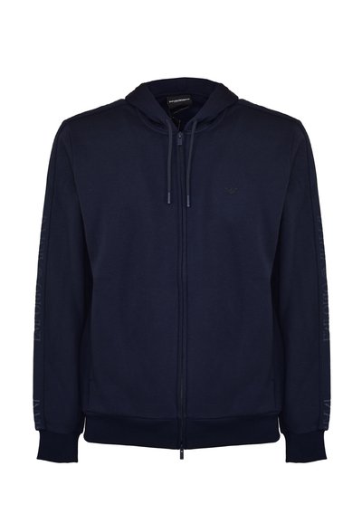 Marinblå zip-hoodie i mjukt tyg, med huva, ribbade ärmslut och strukturerade sidopaneler med logodetaljer på ärmarna.
