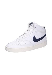 Sneaker alte Nike in pelle bianca con accenti blu navy, dotate di punta perforata, lacci tondi e suola in gomma testurizzata.