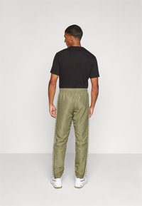 Lacoste Sport TRACK - Pantalon de survêtement - khaki