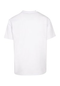 Witte katoenen T-shirt met een ronde hals, korte mouwen en een effen achterkant, met een zachte textuur en een ontspannen pasvorm.