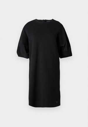 Črna obleka do kolen z napihnjenimi kratkimi rokavi do komolcev in okrogelimi vratnim izrezom, z nežnim logotipom blizu roba.