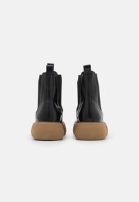 Kennel + Schmenger Bottines à plateau - black