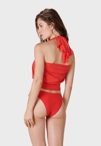 Pain de Sucre KALIS - Ranta-asusteet - red