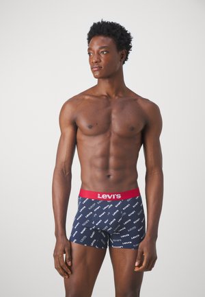Marinefarbenen Boxershorts mit rotem Bund, mit wiederholtem weißen "Levi's"-Logo-Muster. Weicher Stoff, figurbetontes Design und bis zur Mitte des Oberschenkels reichend.