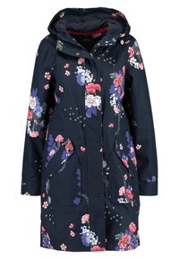 Marineblå vandtæt jakke med blomstermønster og hætte, der har frontknapper, sidelommer og kontrasterende rød foer.