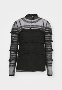 Blusa nera con maniche lunghe, strati di volant e tessuto trasparente con texture. Presenta un collo alto e accenti a righe per contrasto.