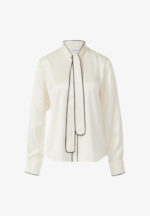 Cremige Bluse mit langen Ärmeln und schwarzer Paspelierung, einem hohen Kragen und einem langen, vorne gebundenen Halstuch-Detail.