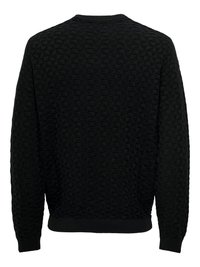 Black knit sweater featuring a textured geometric pattern, ribbed neckline, cuffs, and hem. The design is solid and smooth overall.