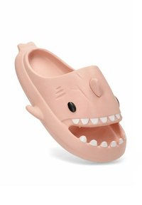 Zueco de goma rosa con forma de tiburón, que presenta ojos negros, dientes blancos y un diseño de boca cortada. Textura suave, bordes redondeados.