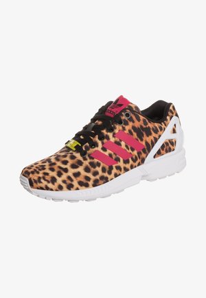 Leopard-print athletic shoe with pink accents, black laces, and a white sole. Features a distinctive design with a textured surface.