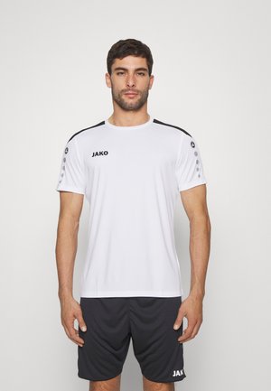 Witte t-shirt met zwarte accenten en logo, korte mouwen, ronde halslijn, gecombineerd met zwarte shorts. Glad materiaal en atletische pasvorm.