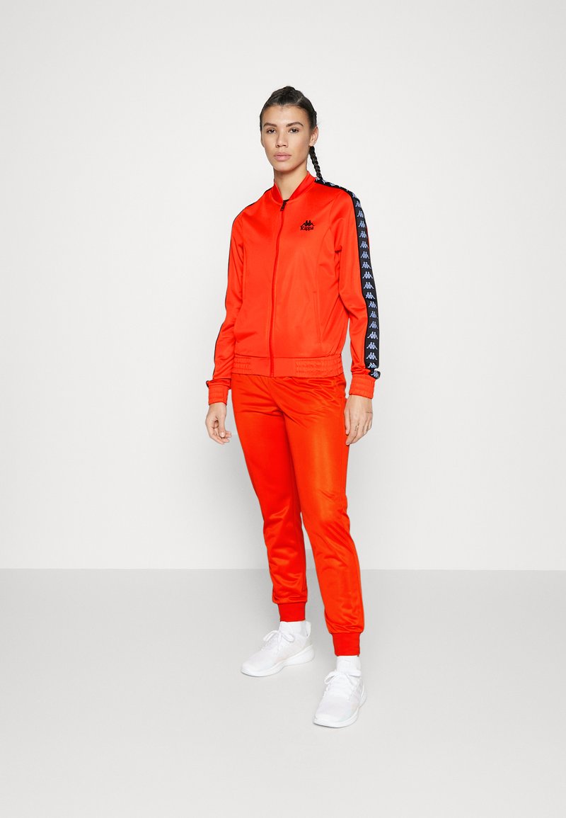 Kappa TRACKSUIT SET Tracksuit orange/coral Zalando.co.uk