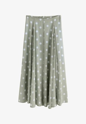 Ilgas raukšlėtas sijonas iš lygaus audinio šviesiai žalia spalva, su didelėmis baltomis taškeliais ir subtilia sagų uždarymo juostele liemens srityje.