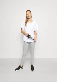 Nike Performance ONE LUXE - T-shirt desportiva - white