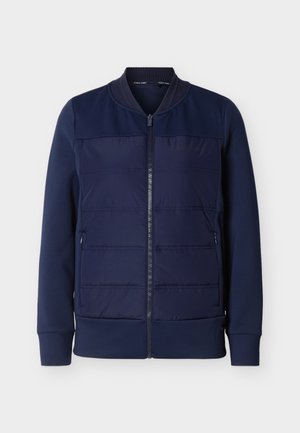 Navyblauw jack met ritssluiting, voorpaneel met padding, geribde kraag, manchetten en zoom, en twee zijzakken met rits.