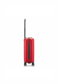 Red hard-shell suitcase with a retractable handle, smooth texture, vertical ridges, and four wheels for mobility.
