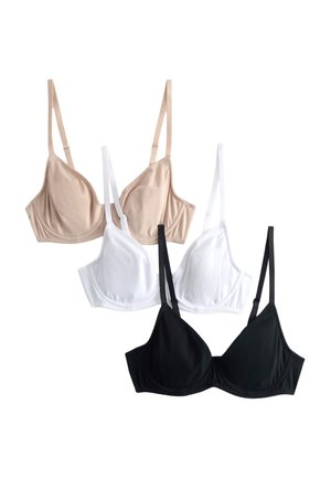 Tre reggiseni beige, bianco e nero con sottili spalline regolabili, disposti sovrapposti su uno sfondo bianco.