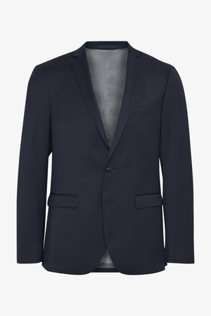 Morski blejzer iz teksturirane tkanine, z enim gumbom spredaj, dvema sprednjima žepoma in gladkim sivim podloženjem. Zanimiv je po svojem krojenju.