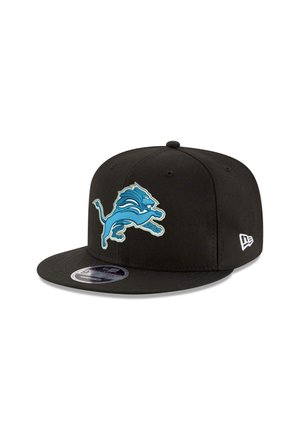 Black cap featuring a blue Detroit Lions logo, flat visor, and structured design; fabric appears smooth with no visible patterns or accents.