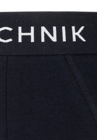 Granatowy pas z białym napisem "TECHNIK"; tekstura ribbed; gładkie wykończenie; dopasowany krój z przeszyciami.