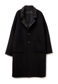 Cappotto di lana nera con grandi tasche a toppa, colletto a lancia e foderatura a quadri grigi. Il design presenta una vestibilità comoda e una chiusura con bottoni.