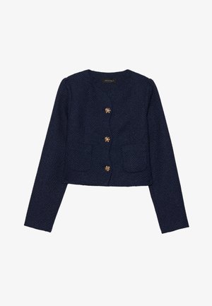 Casaco curto azul-marinho feito de tecido texturizado, com gola redonda, mangas longas e seis botões decorativos em tom dourado.