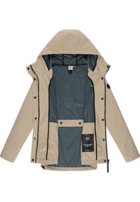 Beige waterproof jacket with detachable hood, featuring snap buttons, a blue interior lining, and a small label on the inner pocket.