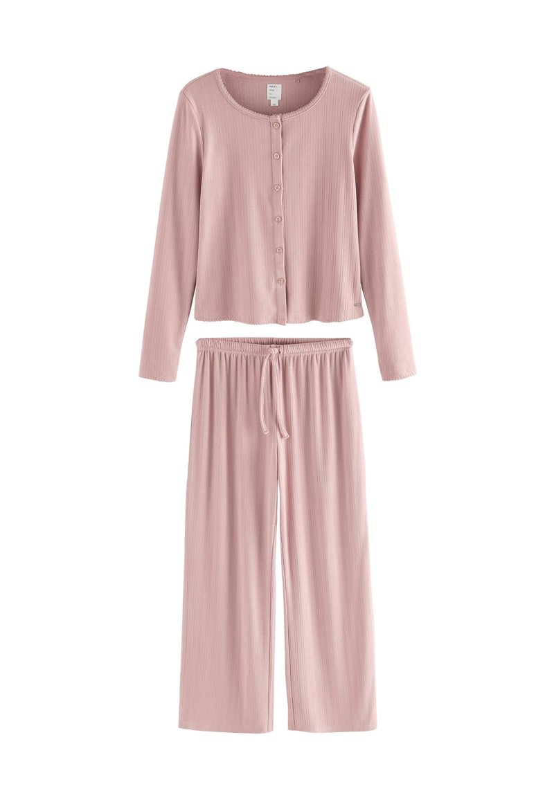 Completo pigiama a due pezzi rosa a coste, composto da una maglia con bottoni a maniche lunghe e colletto tondo, e pantaloni a gamba larga con vita elastica.