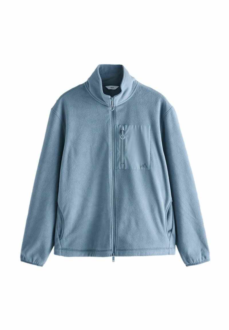 Tiszta kék bolyhos dzseki magas nyakkal, teljes zipzárral és zsebre záródó mellzsebbel. Puha tapintás és laza fazon.