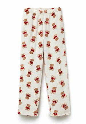 Spodnie piżamowe z polaru z elastycznym pasem, z wzorem misiów w czerwonych koszulkach na kremowym tle. Miękka tekstura.