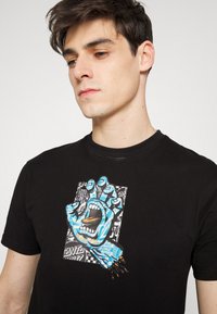 Santa Cruz FLIER HAND UNISEX - T-shirt estampada - black