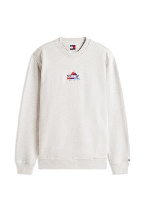 Sweat-shirt gris clair, col rond, poignets et ourlet côtelés, présente un logo triangulaire coloré avec "tommy" et "JEANS" imprimés en dessous.