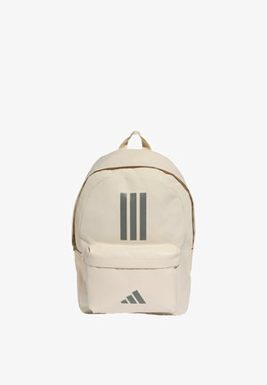 Mochila beige con bolsillo frontal con cremallera y tres rayas verticales encima del bolsillo sobre un fondo blanco liso.