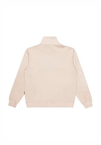 Beige sweatshirt with a high collar, long sleeves, and ribbed cuffs. Features a white logo printed vertically along the left sleeve.