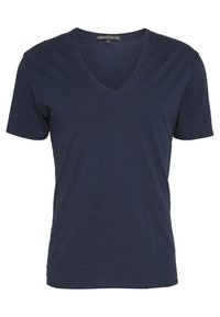 T-shirt blu navy a maniche corte con scollo a V e etichetta di taglia media all'interno del colletto.