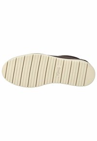 Suela de zapatilla TOMS con un acabado texturizado de goma. Presenta surcos horizontales y un color beige con un logotipo sutil.