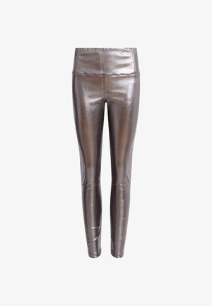 Leggings metallic silver con una texture liscia, dotati di una vita elastica e di un design aderente.