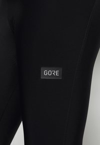 Gore Wear GORE® WEAR PROGRESS THERMO - Leggings - black/neon yellow