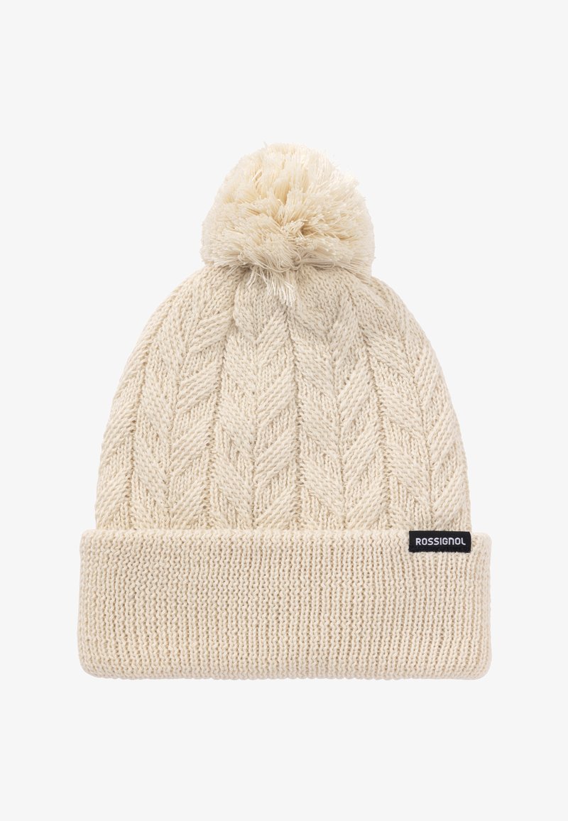Beanie lavorato a maglia di colore crema chiaro con polsino a coste e pom-pom sulla sommità. Presenta un motivo a zigzag testurizzato e una piccola etichetta nera.