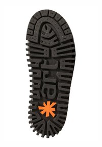 Suela de zapato de goma negra con un patrón texturizado de surcos y un logotipo de estrella naranja. El diseño proporciona agarre y durabilidad.