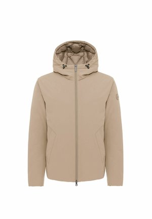 Beige pufferjack met een capuchon, een ritssluiting aan de voorkant, twee zijzakken en een gevoerde voering. Voorzien van trekkoordverstellingen op de capuchon.
