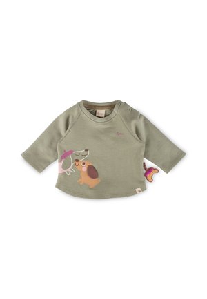 T-shirt bébé à manches longues vert olive avec deux chiens illustrés sur le devant, l'un portant un béret rose et l'autre aux oreilles tombantes.