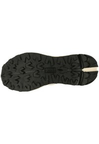Black rubber shoe sole with textured tread pattern, featuring angular shapes for grip. White border along the edge. Durable design for traction.