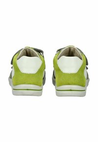 Grøn ruskind og hvid læder sneakers med lav profil, velcro stropper og en tekstureret bagside. Gummisål med en let grøn accent.