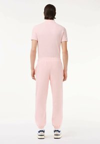 Lacoste CLASSIC - Pantaloni sportivi - rose
