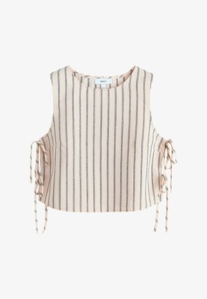 Ujjatlan bézs színű crop top fekete függőleges csíkokkal és oldalsó megkötő részletekkel, fehér háttéren.