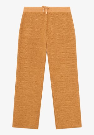 Pantaloni a gamba larga in maglia di un caldo colore marrone dorato. Presentano una vita elastica con cordoncino e un tessuto testurizzato.